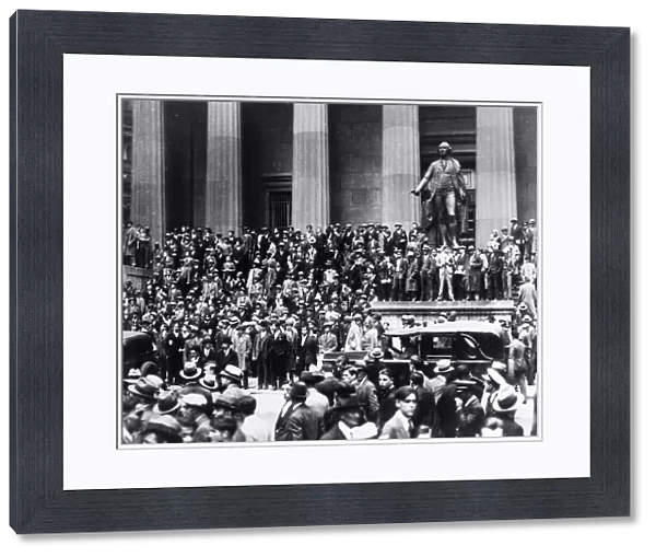WALL STREET CRASH, 1929. Crowds gathered on the steps of the Sub-Treasury Building