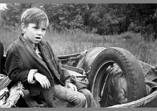 SHARECROPPERs SON, 1935. The son of a evicted and destitute sharecropper, Ozark Mountains