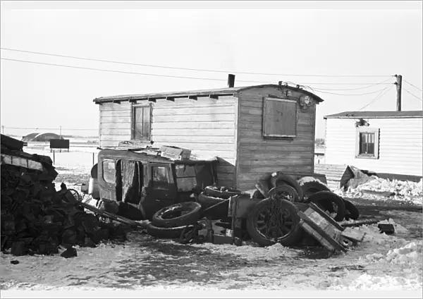 IOWA: SHANTYTOWN, 1936. Backyard of shack in a shantytown in Spencer, Iowa