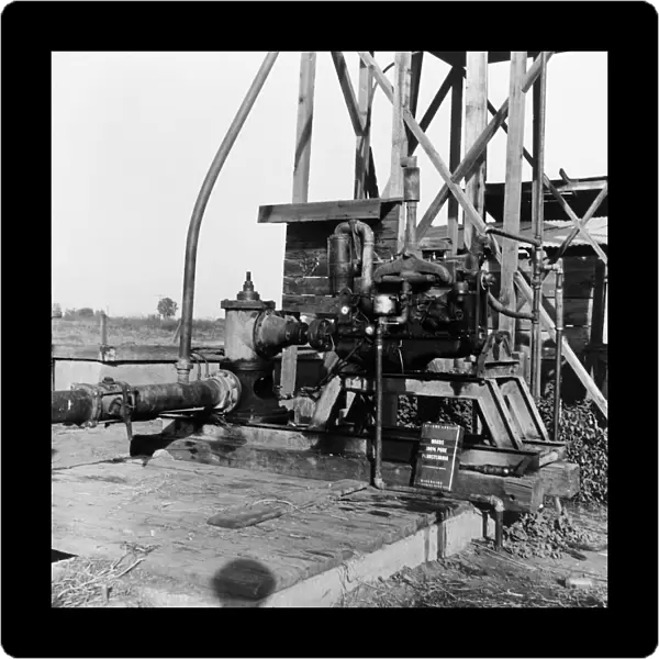 IRRIGATION PUMP, 1938. A pumping plant for irrigation powered by a natural gas