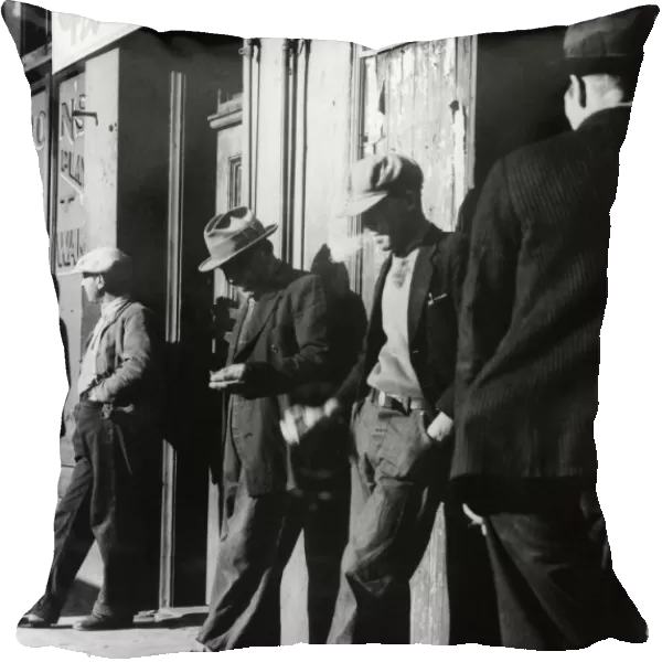 SAN FRANCISCO, 1934. Unemployed men in San Francisco, California. Photograph by Dorothea Lange