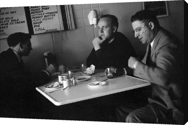 RESTAURANT, c1939. Men sitting in a restaurant, probably Wisconsin. Photograph by John Vachon