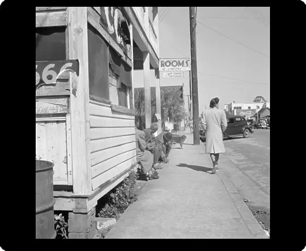 FLORIDA, 1943. Street scene in Daytona Beach, Florida. Photograph by Gordon Parks