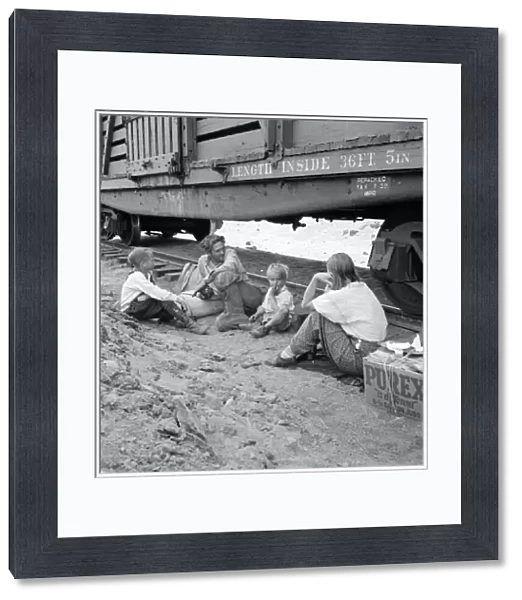 ITINERANT FAMILY, 1939. An itinerant family who travels by freight train in Toppenish, Washington