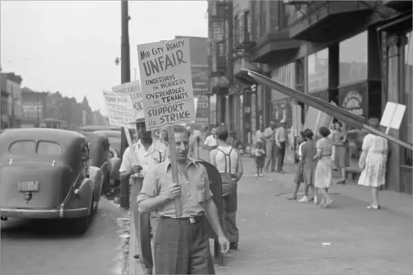 CHICAGO: PICKET LINE, 1941. Picketers outside of the Mid-City Realty Company