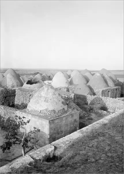 SYRIA: BEEHIVE VILLAGE. A beehive village on the Baghdad Railway, Moselmeih, Syria