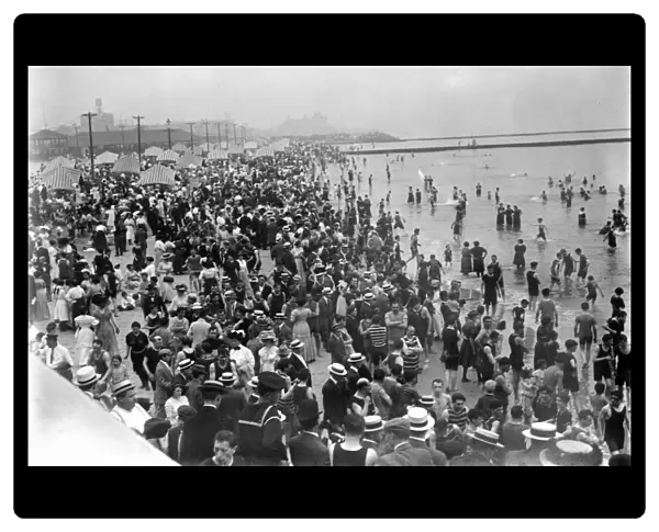 CONEY ISLAND: BEACH. Crowds on July 5th at Coney Island, Brooklyn, New York. Photograph