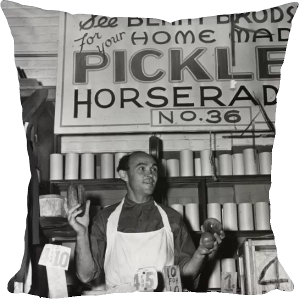 BROOKLYN: PUSHCART, 1940. Benny Brodsky, a pushcart vendor, at his pickle stand in Brooklyn