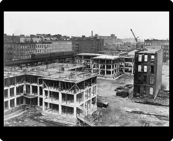NEW YORK: EAST HARLEM. Construction of the James Weldon Johnson Houses, covering