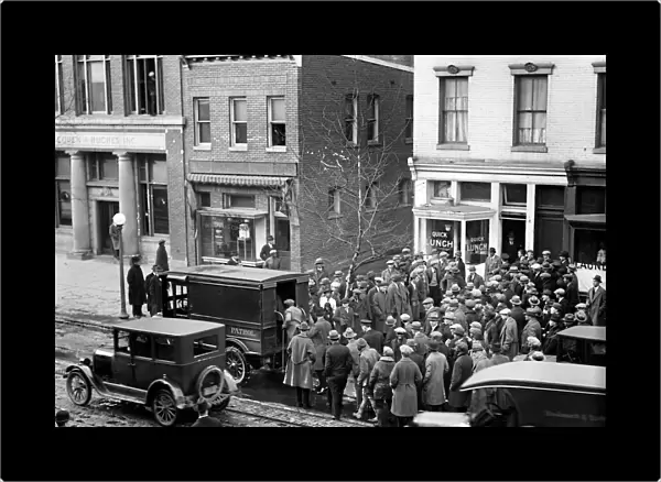 POLICE RAID, 1925. Police raid on a illegal gamblers den on East 12th Street in New York City