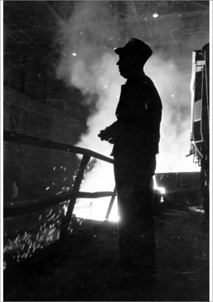 STEEL WORKER, 1949. Steel worker with smelter in Chicago, Illinois steel mill