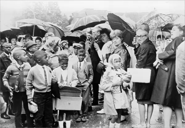 SCHOOL DESEGREGATION, 1965. African American children on their way to school in