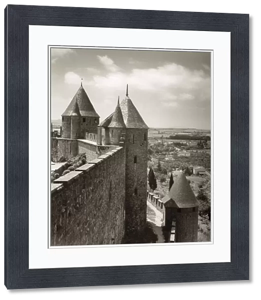 CARCASSONE, 1950. A view of a medieval walled city in Carcassone, France