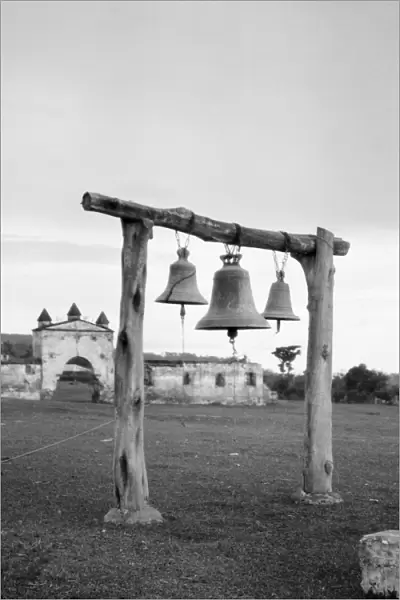 BELLS, c1920. Bells in the yard of a church in Guatemala or Cuba. Photograph by Arnold Genthe