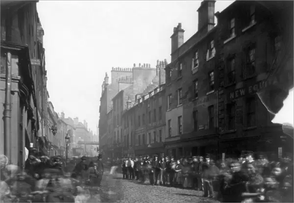 SCOTLAND: GLASGOW, c1878. Crowded street in Glasgow, Scotland. Photograph by Thomas Annan