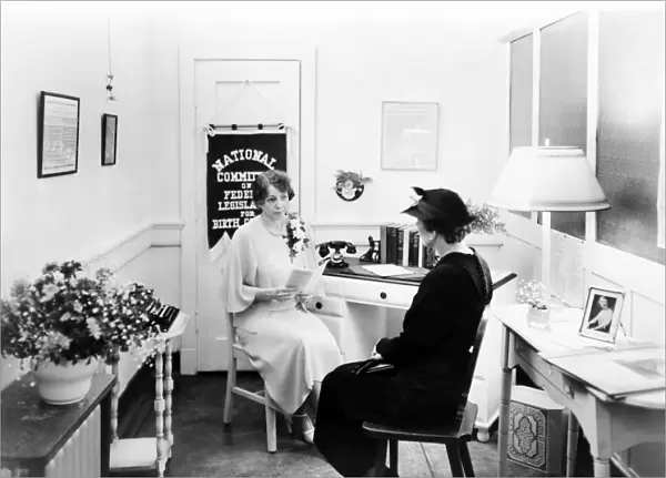 BIRTH CONTROL LOBBY, c1930. Two women in an office of the National Committee