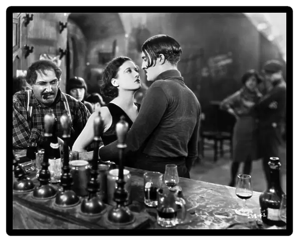 SILENT FILM: PARIS, 1926. Joan Crawford and Douglas Gilmore at the bar of an Apache Den in Paris, 1926