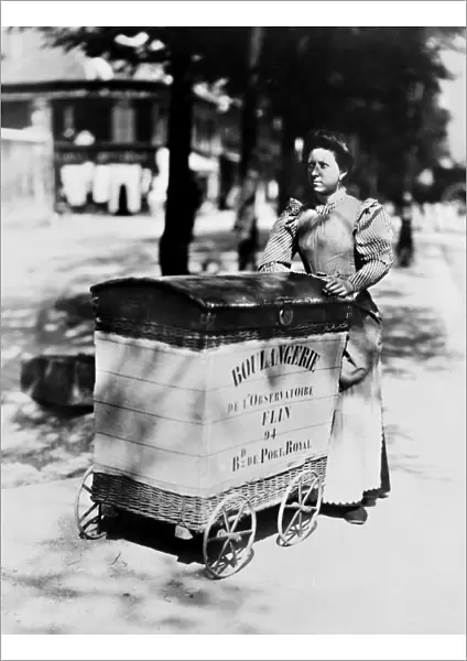 ATGET: DELIVERING BREAD. Woman delivering bread on the Left Bank in Paris, France. Photograph by Eugne Atget, c1898