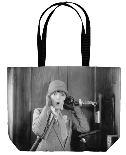 TELEPHONE BOOTH, 1920s. Colleen Moore in a 1920s silent movie still
