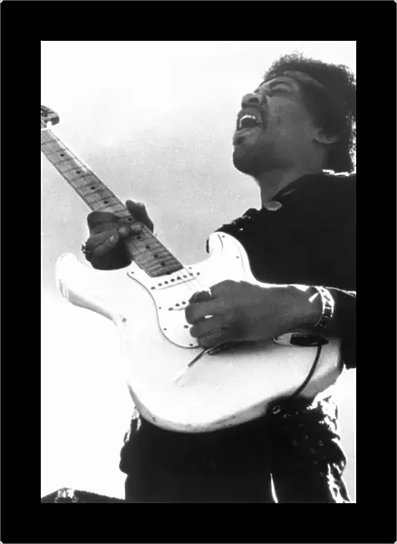 JIMI HENDRIX (1942-1970). American musician. Photographed during a concert at Berkeley, California in 1970