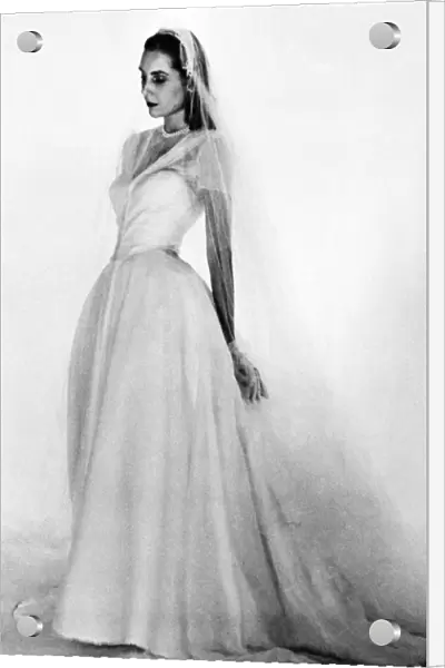 BRIDAL GOWN, 1947. Model wearing a Mainbocher bridal gown. Photographed by Louise Dahl-Wolfe, 1947