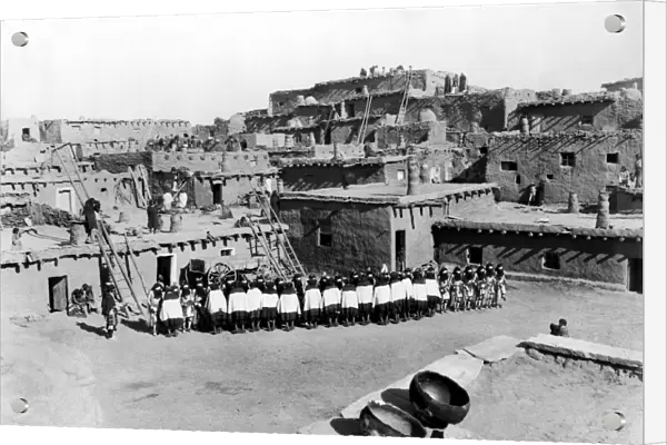 NEW MEXICO: ZUNI CEREMONY. Zuni dancers in the plaza of a pueblo village in New Mexico. Photograph by Ben Wittick, c1897