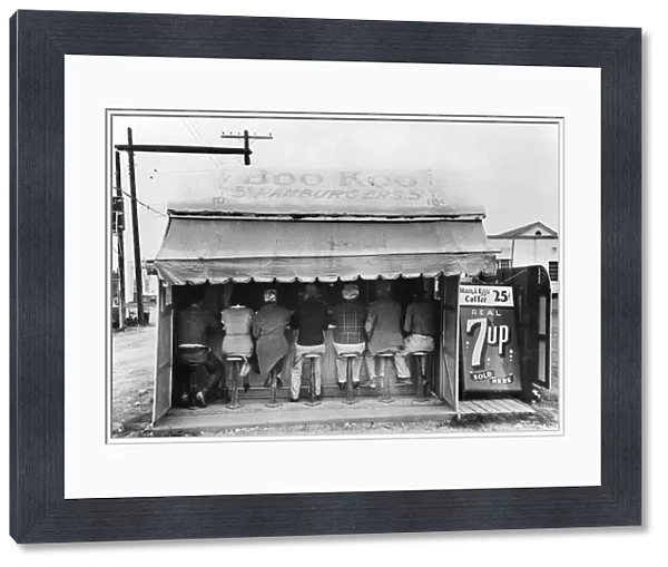 TEXAS: LUNCHEONETTE, 1939. An outdoor hamburger stand at Harlingen, Texas. Photograph by Russell Lee, February 1939