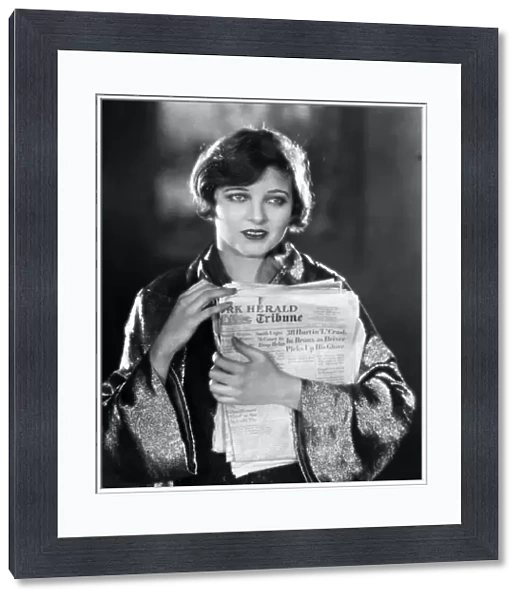 SILENT FILM STILL: READING. Corinne Griffith in Classified, 1925