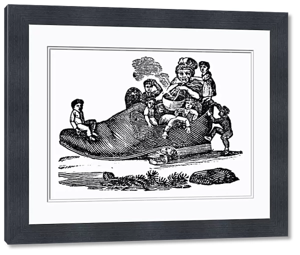 MOTHER GOOSE, 1833. The Old Woman Who Lived in a Shoe. Wood engraving from an 1833 edition of Mother Goose nursery rhymes