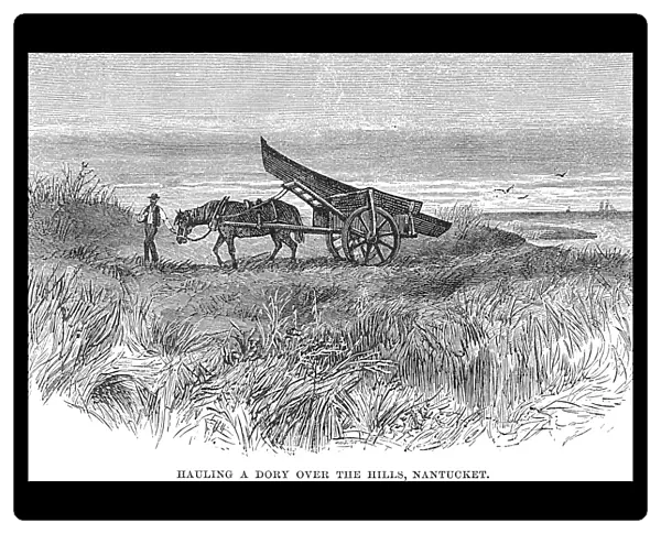 NANTUCKET SCENE, 1875. Hauling a dory over the hills on Nantucket, Massachusetts. Wood engraving, 1875