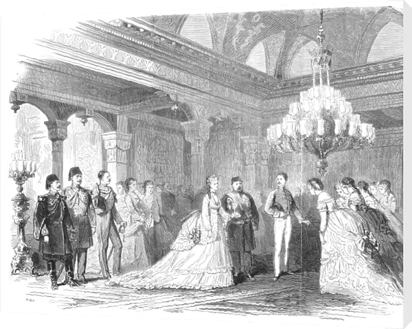 EMPRESS EUGENIE OF FRANCE (1826-1920). Empress of the French, 1853-1871. The empress receives the diplomatic corps in Constantinople, Turkey, during her Mediterranean voyage to Egypt for the opening of the Suez Canal in 1869. Wood engraving from a contemporary French newspaper