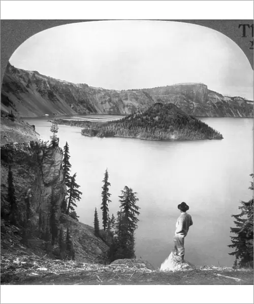 OREGON: CRATER LAKE. A view of Crater Lake, including the peak known as Wizards Island. Photographed c1920