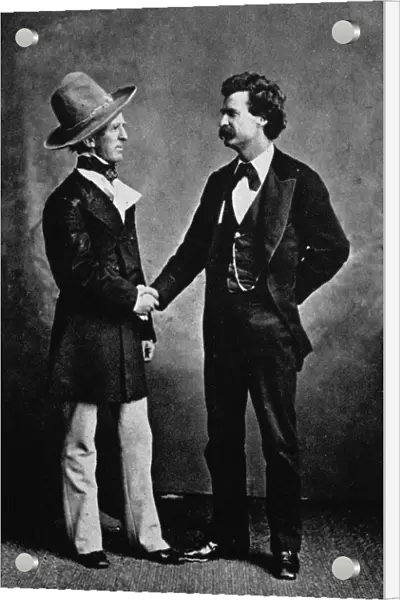 SAMUEL LANGHORNE CLEMENS (1835-1910). Mark Twain. American writer and humorist. The author, right, with American actor John T. Raymond who portrayed Colonel Sellers in Twains dramatization of his novel The Gilded Age, 1873