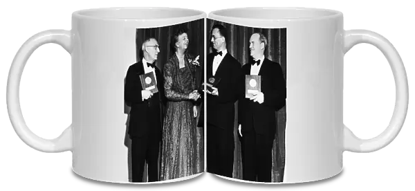 NELSON ALGREN (1909-1981). American writer. Being congratulated by former first lady Eleanor Roosevelt after being presented with the National Book Award for fiction at the Waldorf-Astoria Hotel in New York City, 16 March 1950, with fellow award winners William Carlos Williams (for poetry, left) and Ralph L. Rusk (for nonfiction, right)