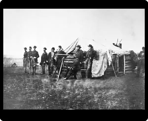 LAFAYETTE CURRY BAKER (1826-1868). American army officer and spy. Baker standing behind, and partially hidden by, the man with the telescope, at General George Gordon Meades headquarters in Virginia during the American Civil War, April 1864