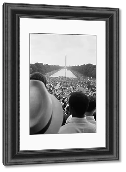 Looking out toward the reflecting pool and Washington Monument at the March on Washington. Photographed by Warren Leffler, 28 August 1963