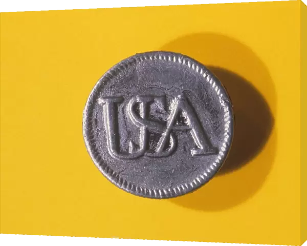 Pewter button from the uniform of an American Revolutionary War soldier
