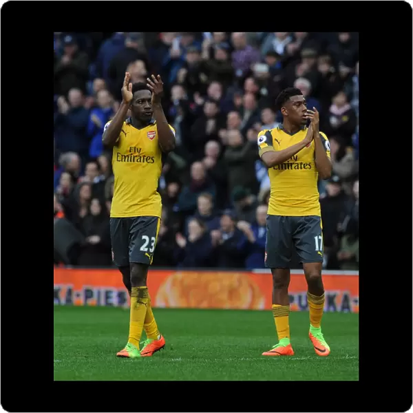Danny Welbeck and Alex Iwobi (Arsenal) clap the fans after the match