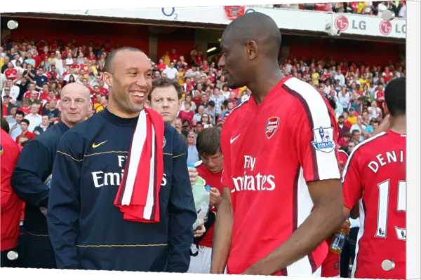 Mikael Silvestre and Abou Diaby (Arsenal) after the match