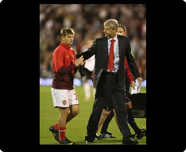 Arsenal manager Arsene Wenger with Andrey Arshavin