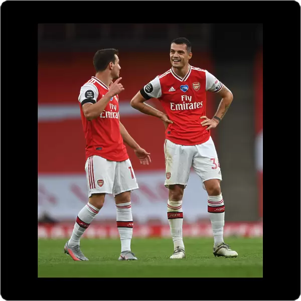 Arsenal's Cedric Soares and Granit Xhaka in Action against Norwich City (2019-20)