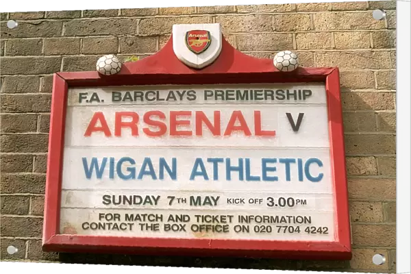 The fixture board displays the Wigan Athltic match, the last at Highbury