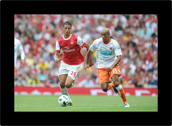 Arsenal's Chamakh Scores Hat-trick in 6-0 Victory over Blackpool's Baptiste
