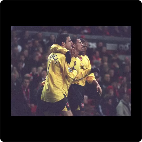 Jeremie Aliadiere celebrates scoring Arsenals 1st goal with Cesc Fabregas