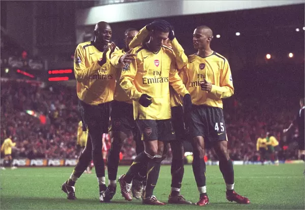 Jeremie Aliadiere is congratulated by Abou Diaby and Armand Traore for setting up Julio Baptista for Arsenals 6th goal. Liverpool 3: 6 Arsenal. Catling Cup 5th Round. Anfield, Liverpool, 9  /  1  /  07. Credit: Arsenal Football Club  / 
