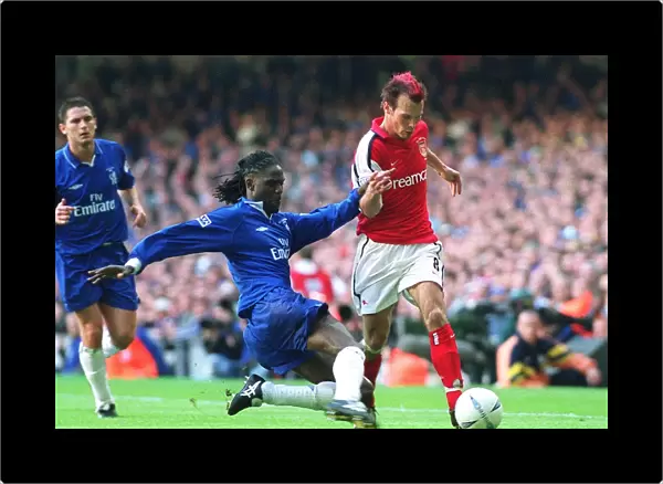 Fredrik Ljungberg (Arsenal) Mario Melchiot (Chelsea). Arsenal 2: 0 Chelsea