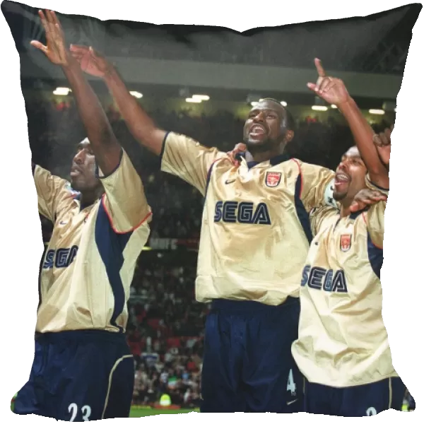 Patrick Vieira, Ashley Cole, Lauren and Sol Campbell celebrate the Arsenal Championship victory afte