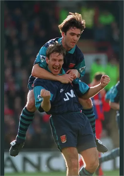 Paul Merson celebrates his goal for Arsenal with Eddie McGoldrick