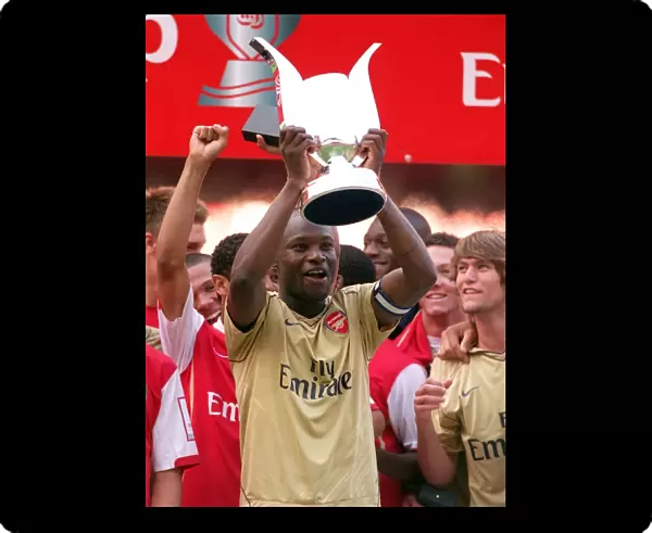 William Gallas lifts the Emirates Trophy for Arsenal