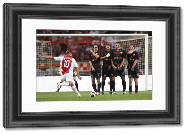 Tomas Rosicky, Mathieu Flamin, Robin van Persie and Alex Hleb in the Arsenal wall